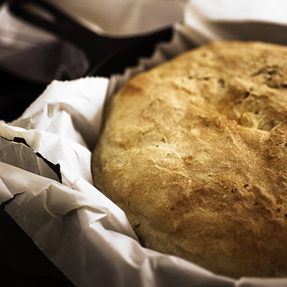 homemade bread in a cast iron skillet.